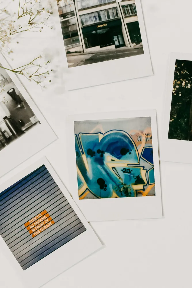 Scattered street and graffiti Polaroids — the Capture Film roots