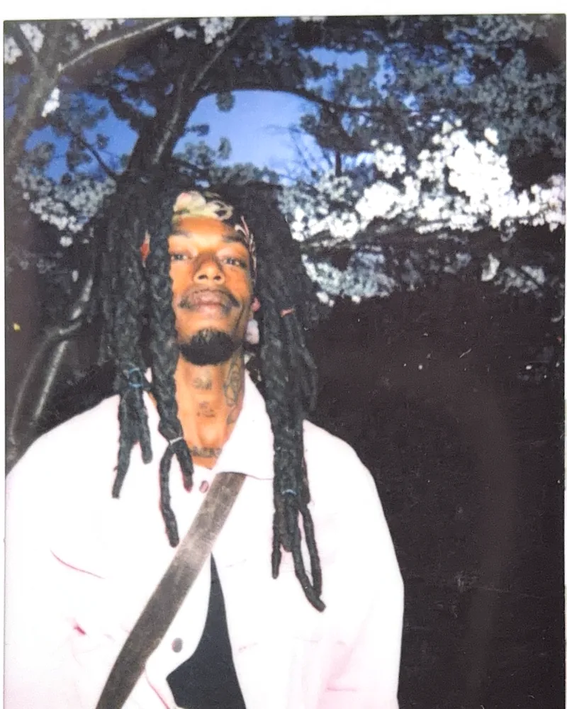 A candid Polaroid portrait by Capture Film